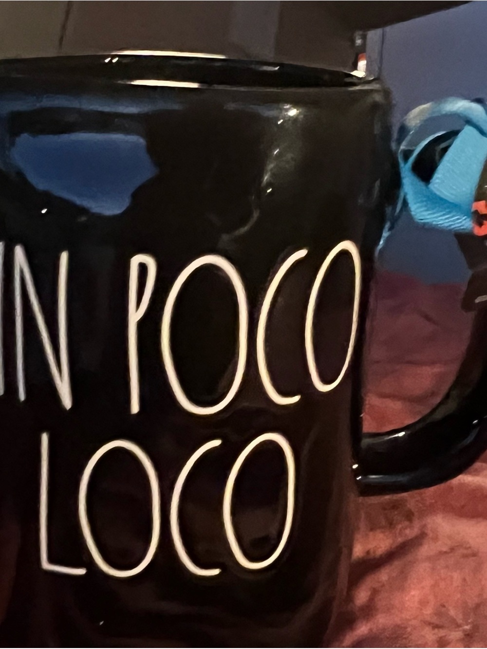 black ceramic Rae Dunn Disney Pixar Coco "Un Poco Loco" mug